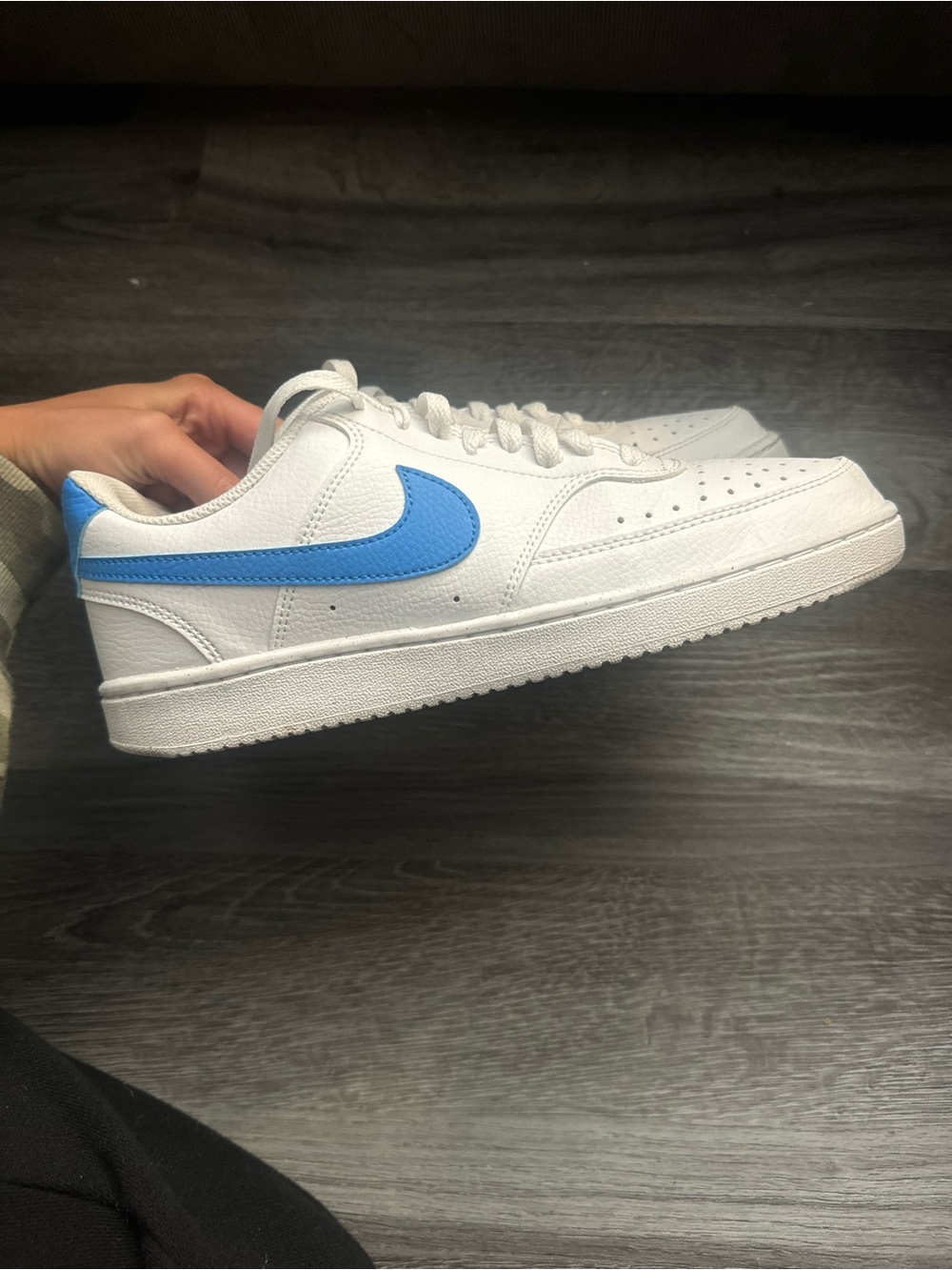 Women’s Nike White Sneakers with Blue Swoosh - Classic Athletic Style